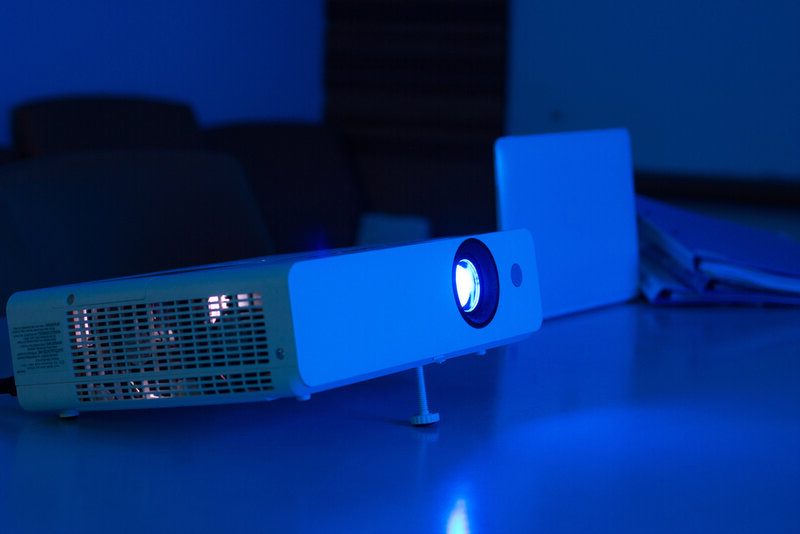 A projector connected to the laptop